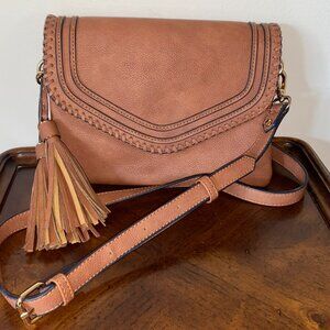 Brown convertible crossbody bag/clutch with two oversized tassels